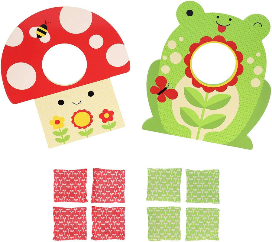 Contents of Petit Collage Toadstool Toss Wooden Cornhole Game box featuring colorful mushroom and frog designs with bean bags for a kids’ outdoor tossing game.