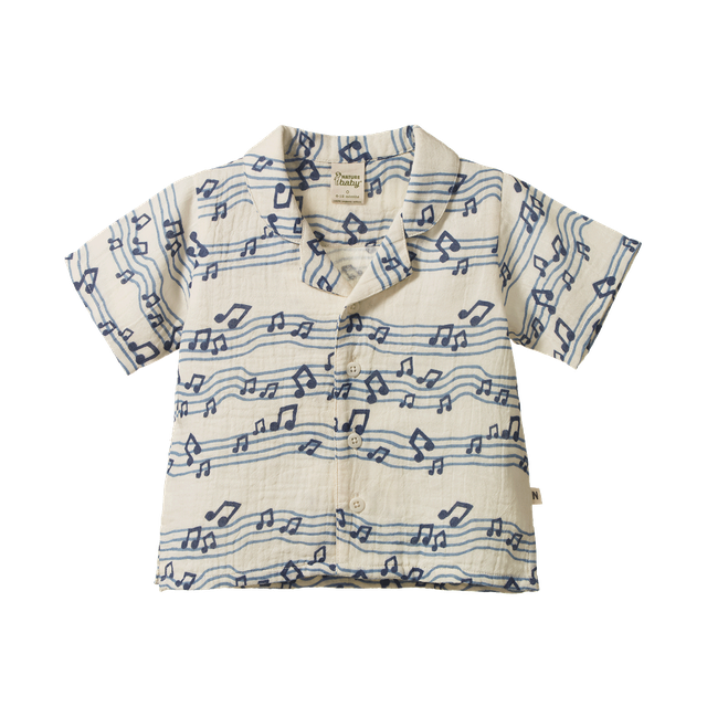 Nature Baby Guthrie Shirt in Muslin Rhythm Print, featuring a lightweight organic cotton muslin shirt with an all-over abstract blue, green, yellow, and cream pattern. The short-sleeve shirt has a classic collar, button-front closure, chest pocket, and a relaxed fit for everyday wear.