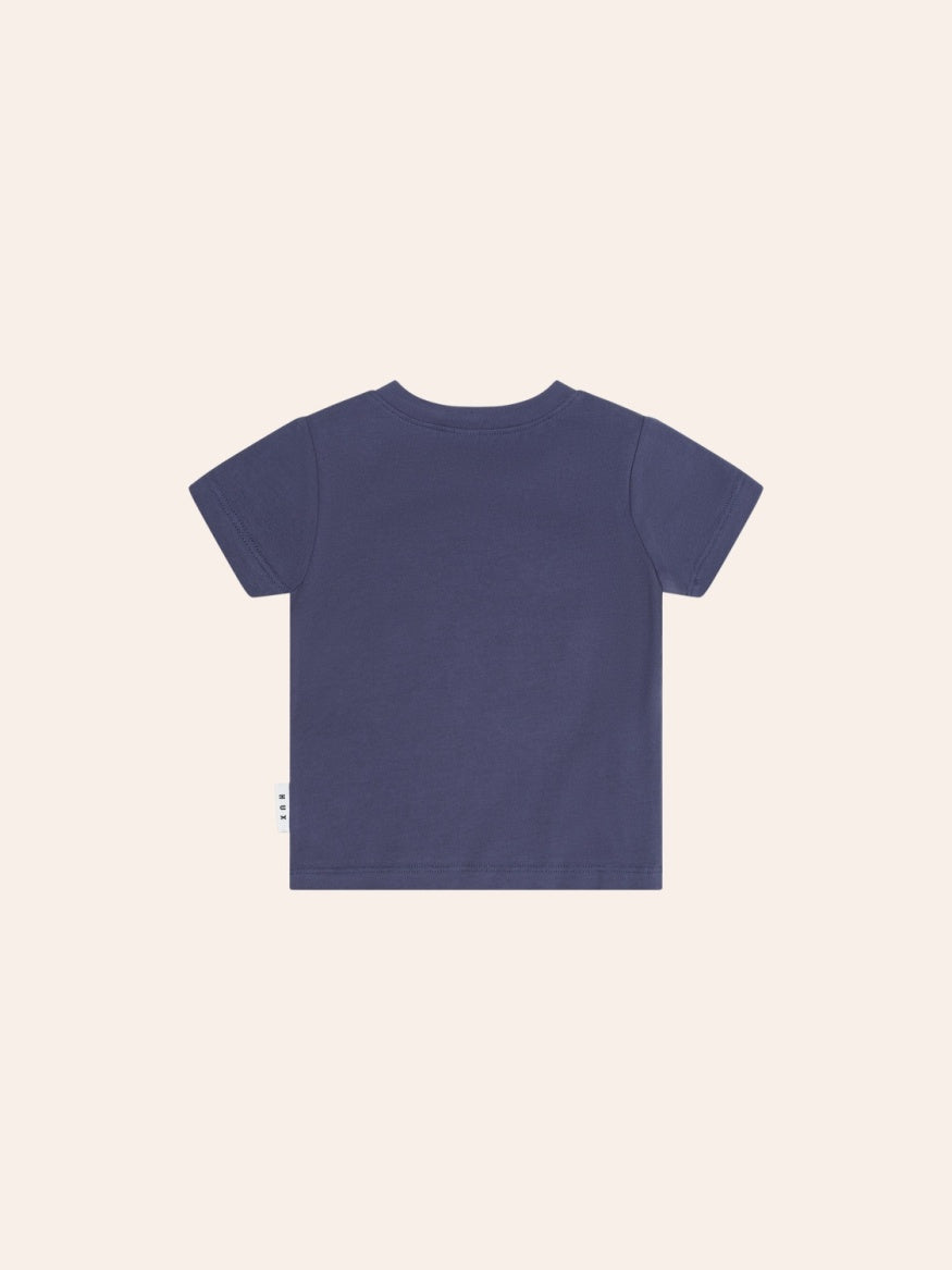 Back view of Huxbaby Gingerbread Tee featuring a festive gingerbread Hux character graphic on a comfortable kids’ Christmas t-shirt.