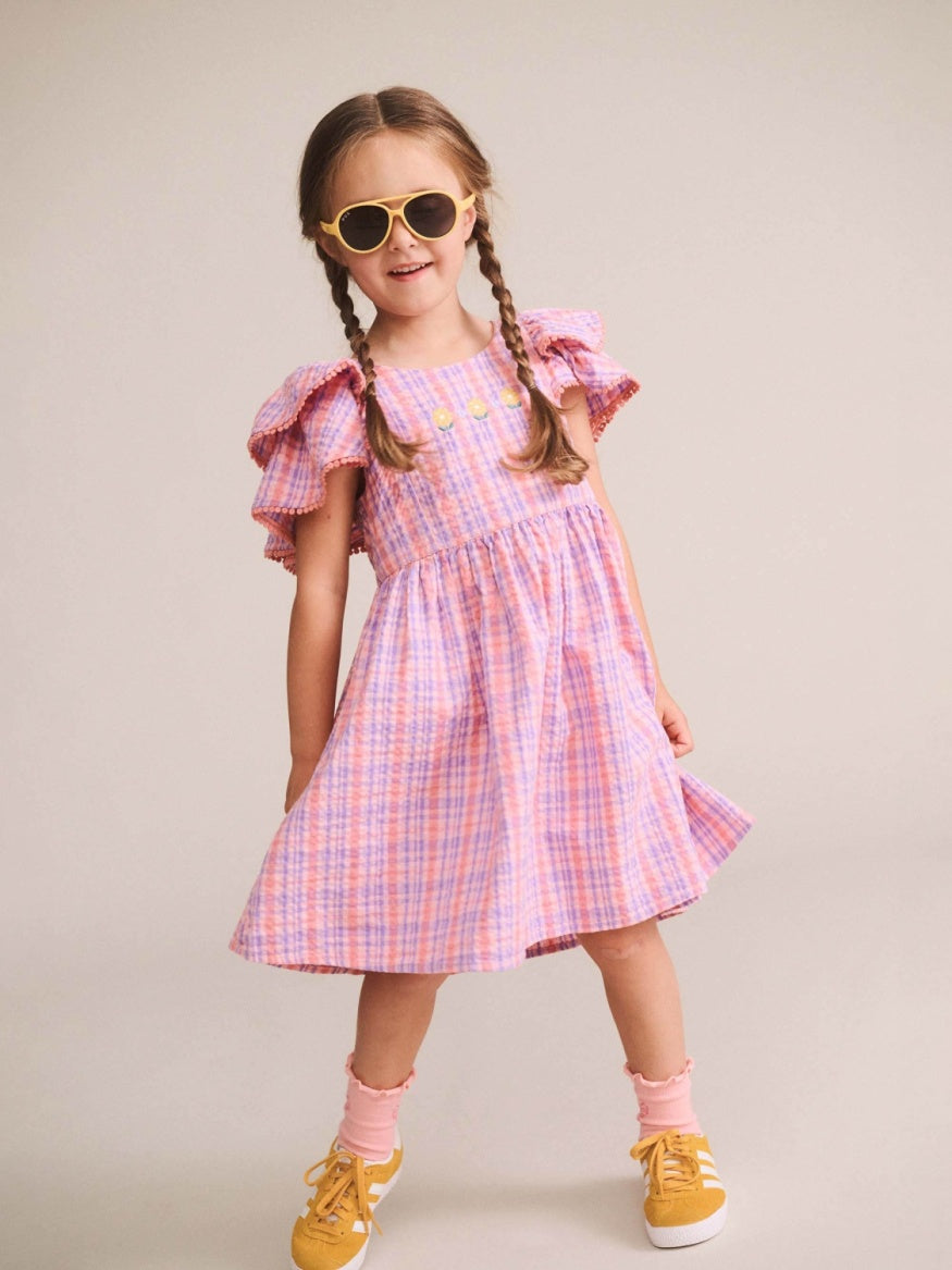 Huxbaby Floral Tropical Check Dress with embroidered flowers, flutter sleeves, and a soft summer style for kids.