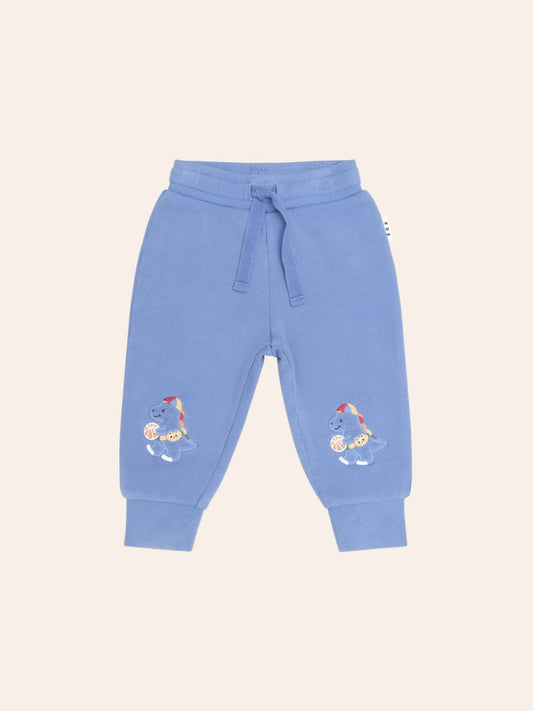Huxbaby Baller Dino Sporty Stripe Sweatpants in  blue with colourful dinosaur print, striped side panels, and a comfortable elastic waistband.