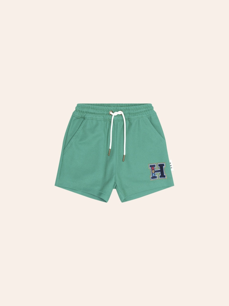 Huxbaby Collegiate Pique Shorts featuring a soft pique fabric, elastic waistband, and comfortable relaxed fit