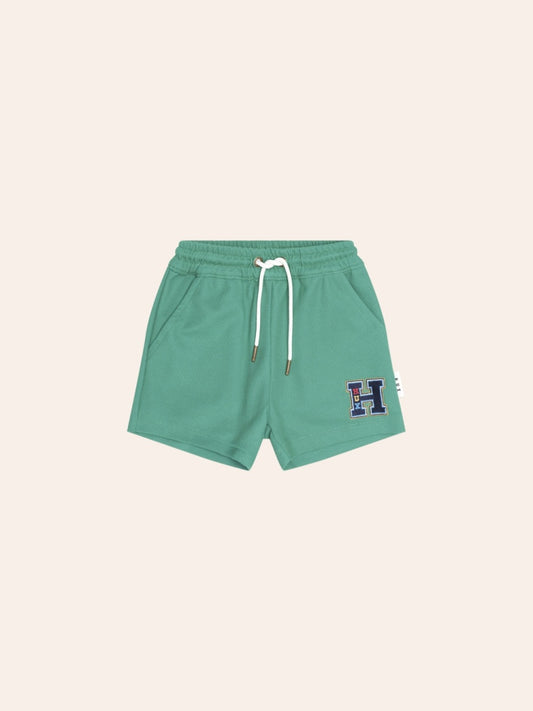Huxbaby Collegiate Pique Shorts featuring a soft pique fabric, elastic waistband, and comfortable relaxed fit