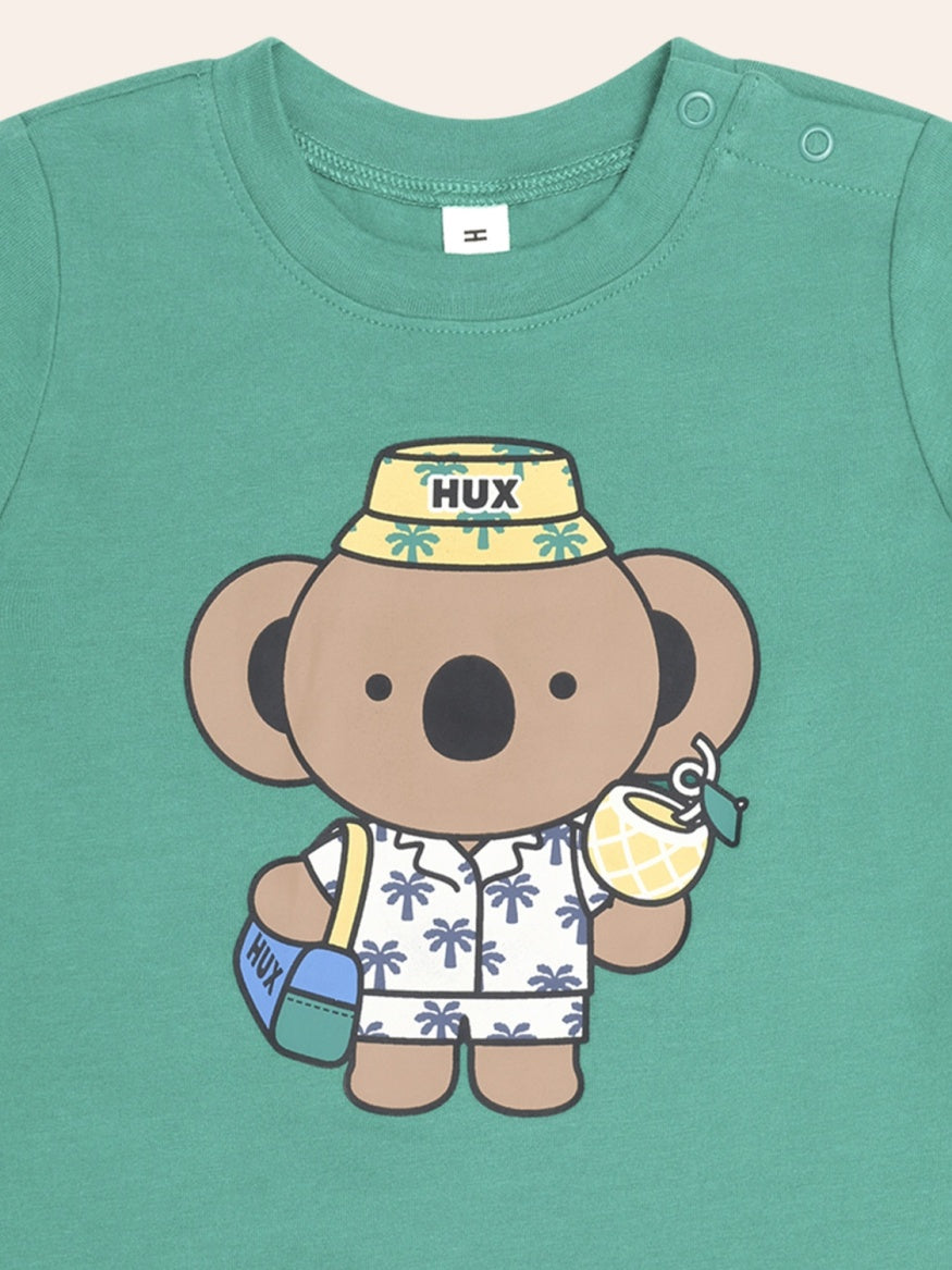 Koala print Huxbaby Vacay Kel Tee featuring a soft relaxed fit, lightweight fabric, and casual kids’ t-shirt design for everyday comfort.