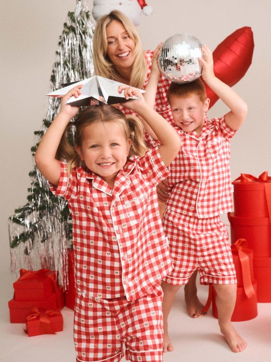 Huxbaby Huxbear Check PJ Set featuring a festive check print button-up shirt and shorts made from soft cotton kids’ sleepwear.