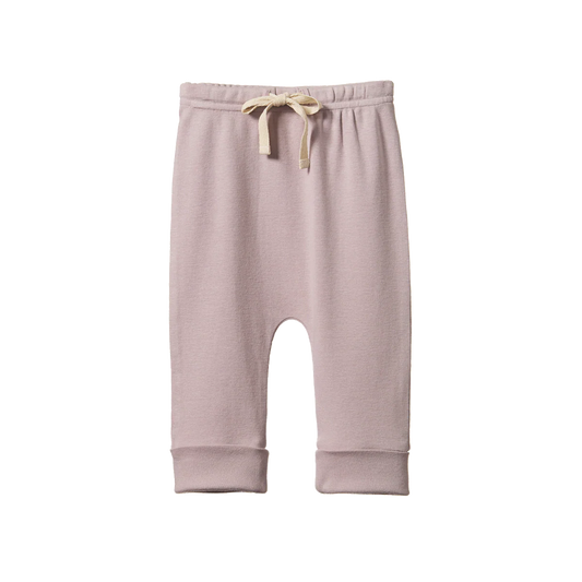 Nature Baby lilac drawstring pants made from soft fabric, featuring an elastic waistband with an adjustable drawstring, relaxed straight-leg fit, and a minimalist design in a light pastel purple color.