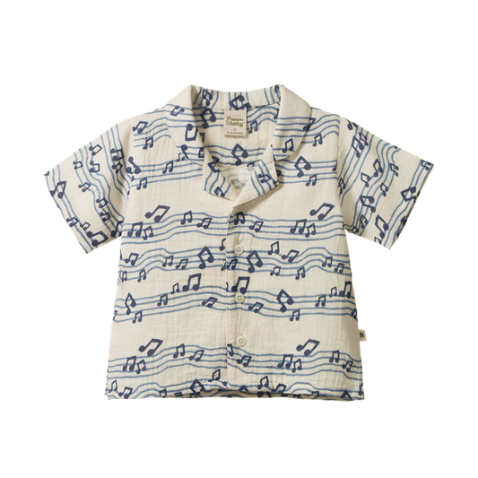 Nature Baby Guthrie Shirt in Muslin Rhythm Print, featuring a lightweight organic cotton muslin shirt with an all-over abstract blue, green, yellow, and cream pattern. The short-sleeve shirt has a classic collar, button-front closure, chest pocket, and a relaxed fit for everyday wear.