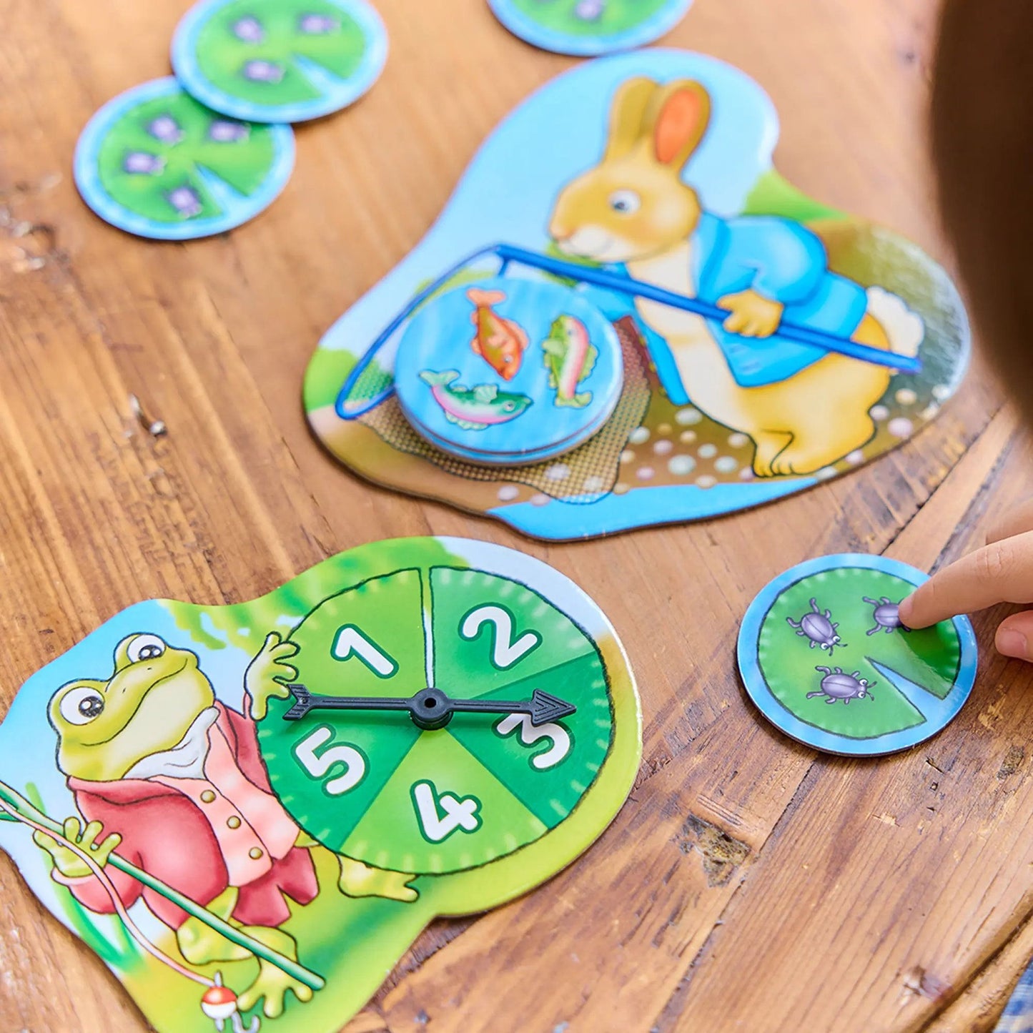 Preschool Orchard Toys Peter Rabbit Fish and Count board game featuring Beatrix Potter characters